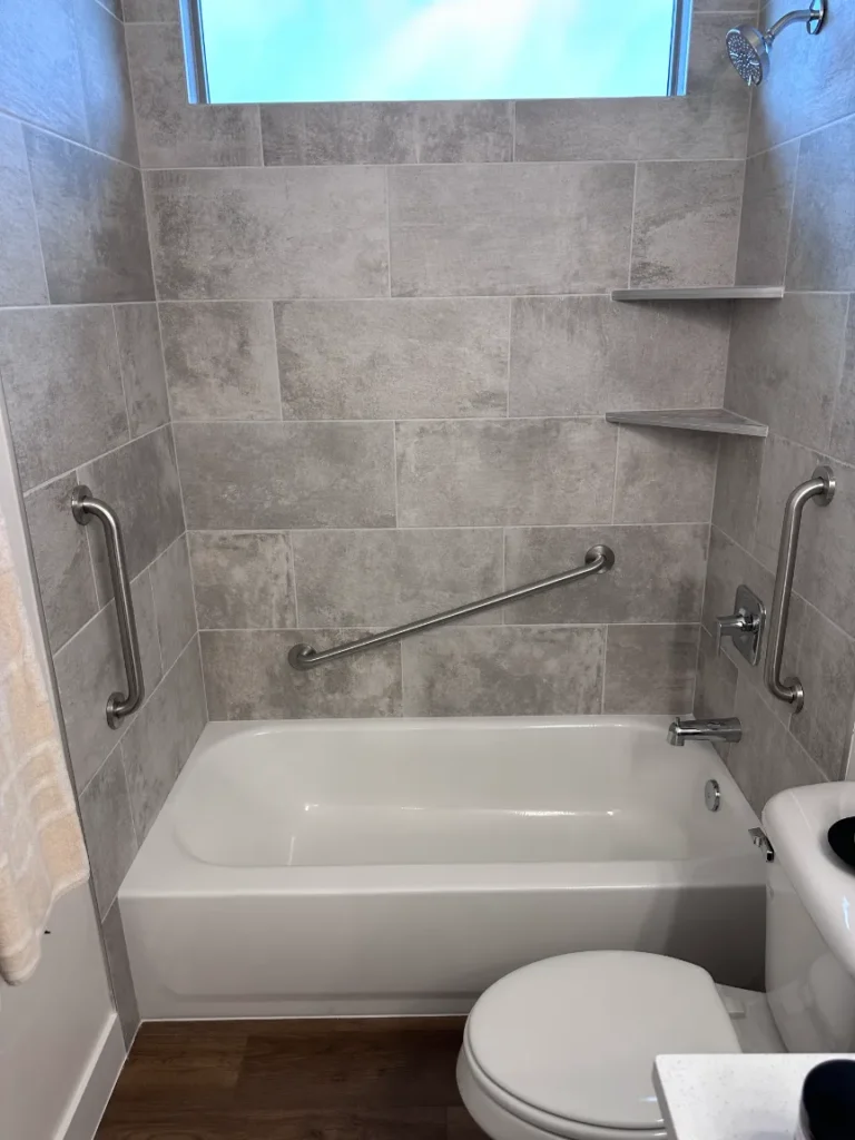 Brushed Stainless angled grab bar and hand grab bars on existing tub